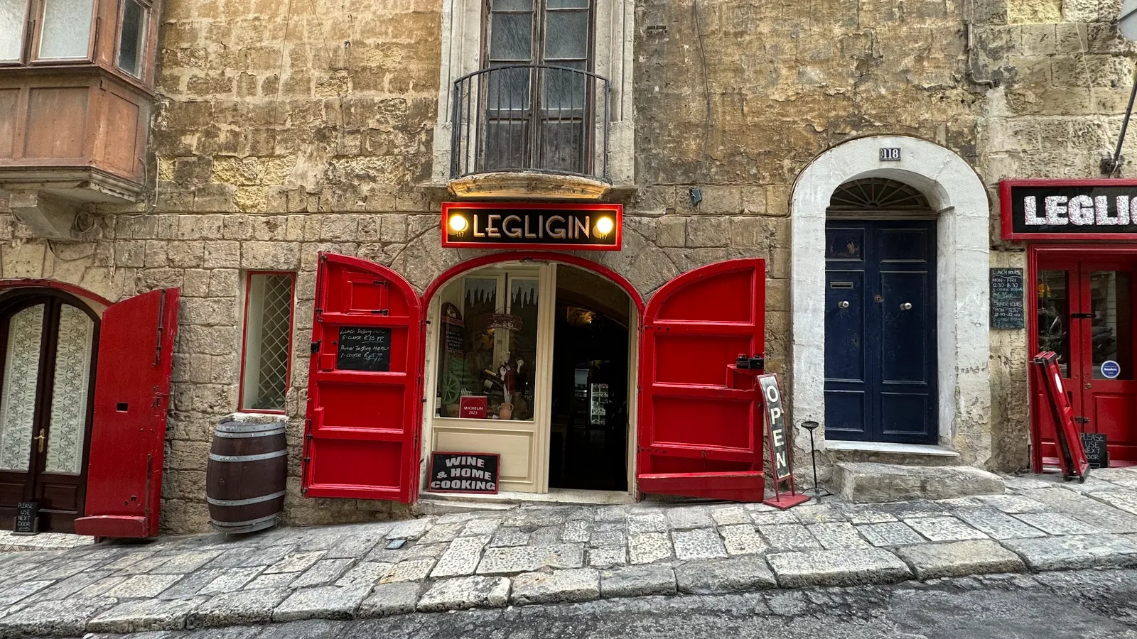 Legligin wine bar in Valletta, red doors wide open